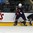 GRAND FORKS, NORTH DAKOTA - APRIL 17: USA's Luke Martin #2 and Latvia's Haralds Strombergs #26 make contact during preliminary round action at the 2016 IIHF Ice Hockey U18 World Championship. (Photo by Matt Zambonin/HHOF-IIHF Images)

